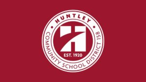 Huntley Community School District logo on a red background.