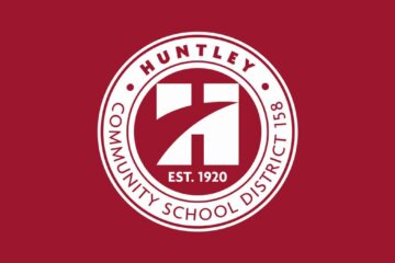Huntley Community School District logo on a red background.