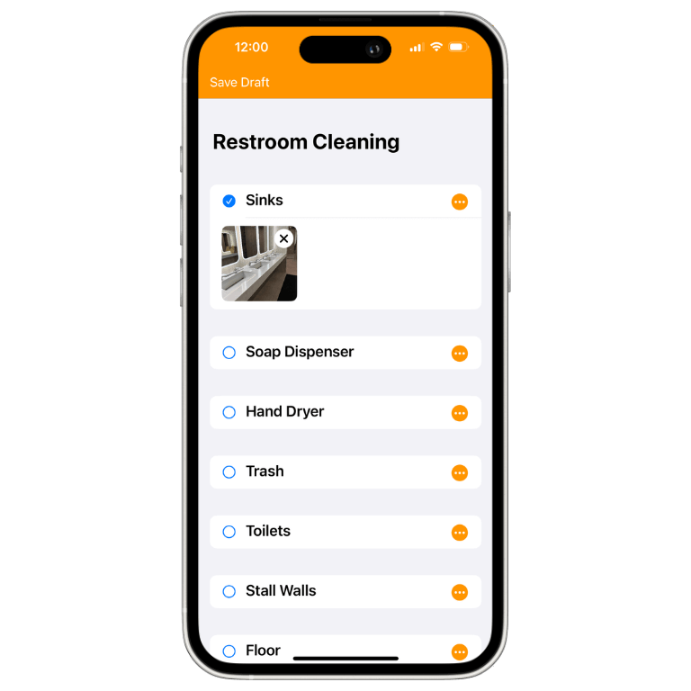 iPhone with a checklist for cleaning a restroom. "Sink" is marked off with a photo.