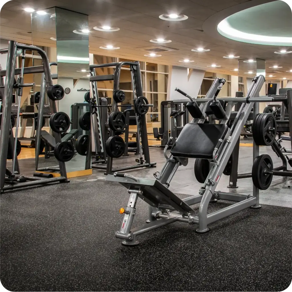 A photo showing gym equipment, illustrating proper fitness center maintenance and cleaning.